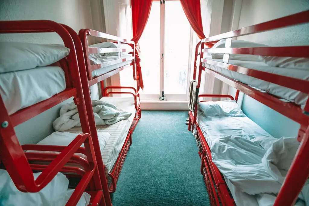 photo of a hostel room with two bunk beds