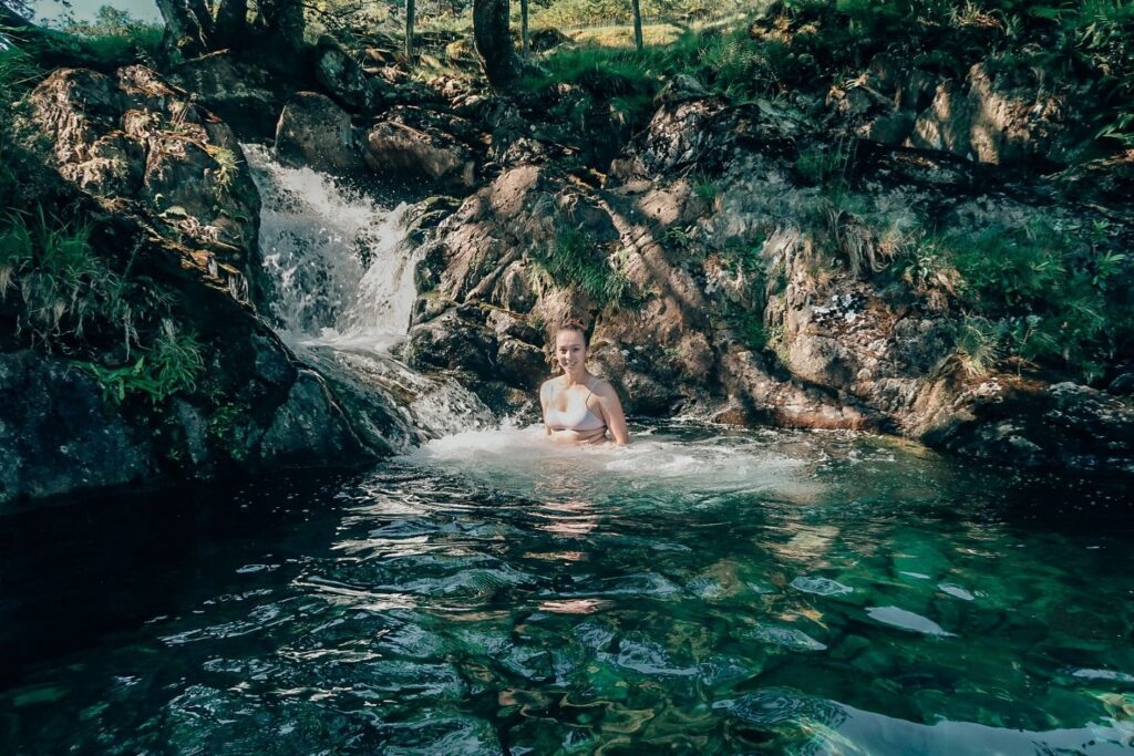north Wales travel guide having a dip in the Watkins path waterfall snowdonia