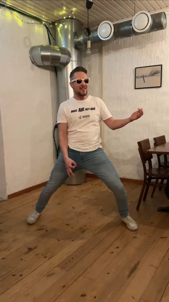 a world champion in air guitar is showing us how it done.